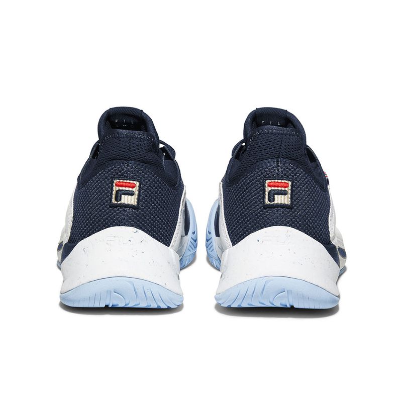 Blue fila sneakers on sale